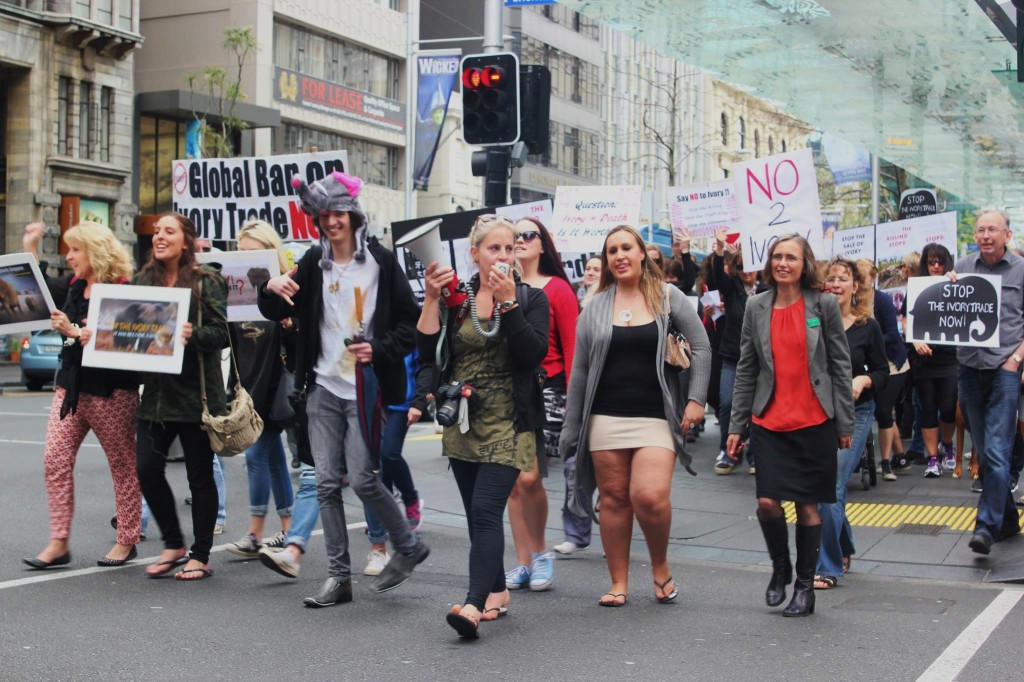 People march to raise awareness about wildlife poaching.